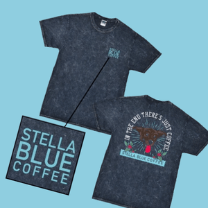 A stylish t-shirt featuring a vibrant Stella Blue Coffee logo, perfect for coffee lovers and casual wear.