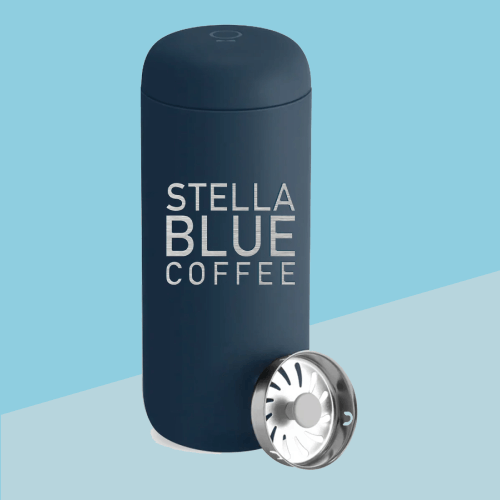 A cozy thermos of Stella Blue coffee, showcasing its inviting color, perfect for a relaxing moment.