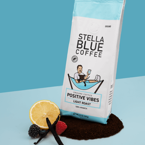 A bag of Positive Vibes coffee symbolizing good vibes, ready to uplift your spirits with its warm, inviting presence set against a simple background.