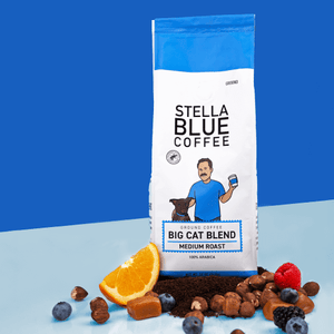 A cozy coffee bag labeled "Stella Blue Coffee Big Cat Blend," featuring a playful big cat design and rich coffee aroma.