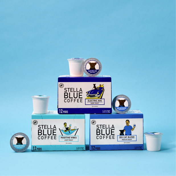 a stack of stella blue coffee pods and their boxes